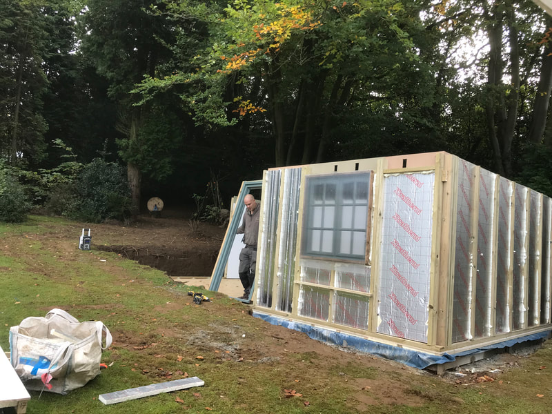 First few panels in place to make the garden cabin