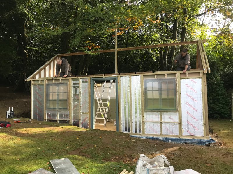 All the walls up and ready for the roof structure to go on. Garden Cabin build